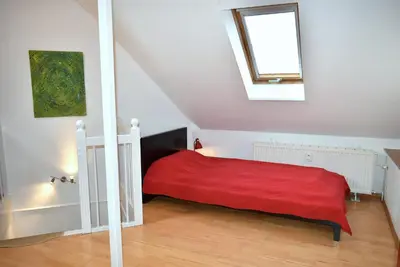 Ein Bett oder Betten in einem Zimmer der Unterkunft Ostseeallee 6 Ferienwohnung Treibholz