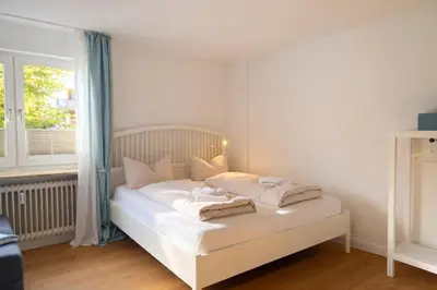 Ein Bett oder Betten in einem Zimmer der Unterkunft Beachfront Studio - 1 Strandreihe