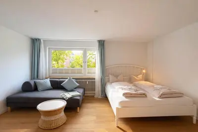Ein Bett oder Betten in einem Zimmer der Unterkunft Beachfront Studio - 1 Strandreihe