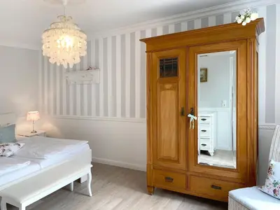 Ein Bett oder Betten in einem Zimmer der Unterkunft Haus Midsommer