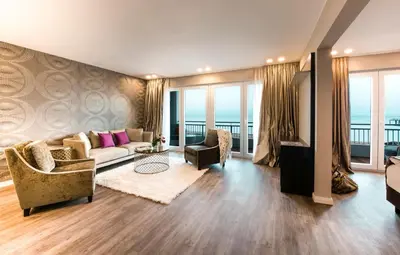 Ein Bett oder Betten in einem Zimmer der Unterkunft Strandhotel Luv