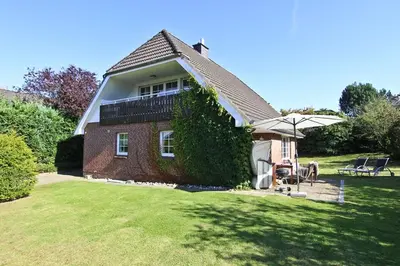 Ein Garten an der Unterkunft Ferienhaus Ostseerausch