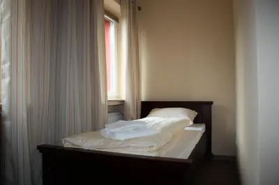 Ein Bett oder Betten in einem Zimmer der Unterkunft Der Gutschmecker Bad Segeberg