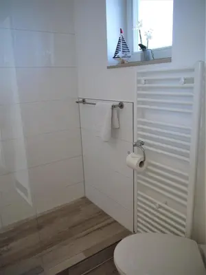 Ein Badezimmer in der Unterkunft Strandperle 3