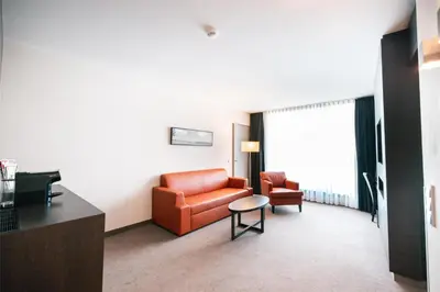 Ein Sitzbereich in der Unterkunft ATLANTIC Hotel Lübeck