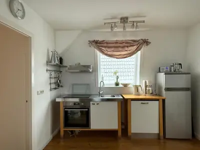 Küche/Küchenzeile in der Unterkunft Wohnen&Wellness Kurgartenstrasse