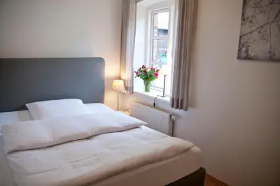 Ein Bett oder Betten in einem Zimmer der Unterkunft Ferienwohnung Ella