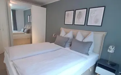 Ein Bett oder Betten in einem Zimmer der Unterkunft Apartmentvermittlung Mehr als Meer - Objekt 73