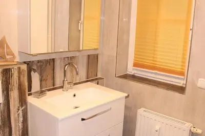 Ein Badezimmer in der Unterkunft Apartmentvermittlung Mehr als Meer - Objekt 73