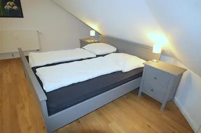 Ein Bett oder Betten in einem Zimmer der Unterkunft Apartmentvermittlung Mehr als Meer - Objekt 74