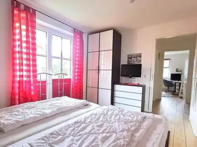 Ein Bett oder Betten in einem Zimmer der Unterkunft Apartmentvermittlung Mehr als Meer - Objekt 60