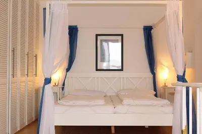 Ein Bett oder Betten in einem Zimmer der Unterkunft Apartmentvermittlung Mehr als Meer - Objekt 7