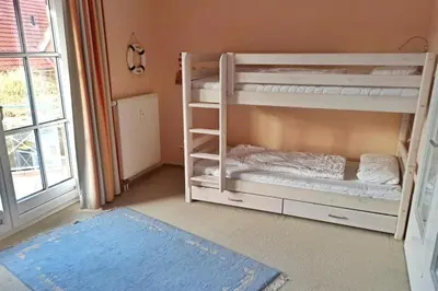 Ein Bett oder Betten in einem Zimmer der Unterkunft Apartmentvermittlung Mehr als Meer - Objekt 20