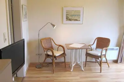 Ein Sitzbereich in der Unterkunft Apartmentvermittlung Mehr als Meer - Objekt 46