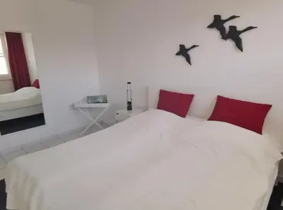 Ein Bett oder Betten in einem Zimmer der Unterkunft Apartmentvermittlung Mehr als Meer - Objekt 18