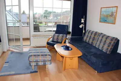 Ein Sitzbereich in der Unterkunft Apartmentvermittlung Mehr als Meer - Objekt 54