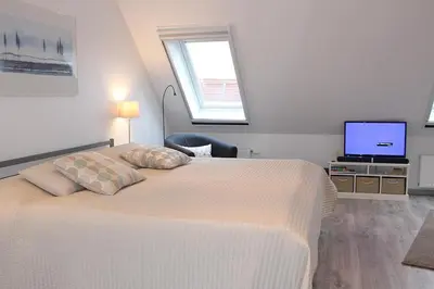 Ein Bett oder Betten in einem Zimmer der Unterkunft Apartmentvermittlung Mehr als Meer - Objekt 15