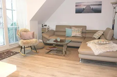 Ein Sitzbereich in der Unterkunft Apartmentvermittlung Mehr als Meer - Objekt 15