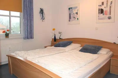 Ein Bett oder Betten in einem Zimmer der Unterkunft Apartmentvermittlung Mehr als Meer - Objekt 52