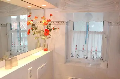 Ein Badezimmer in der Unterkunft Apartmentvermittlung Mehr als Meer - Objekt 52