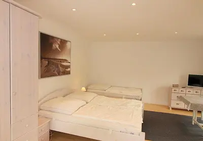 Ein Bett oder Betten in einem Zimmer der Unterkunft Apartmentvermittlung Mehr als Meer - Objekt 1