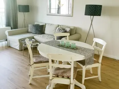 Ein Sitzbereich in der Unterkunft Apartmentvermittlung Mehr als Meer - Objekt 26