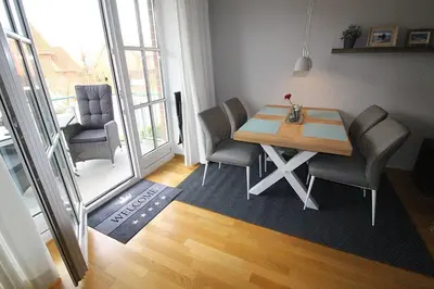 Ein Sitzbereich in der Unterkunft Apartmentvermittlung Mehr als Meer - Objekt 5