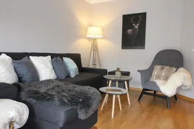 Ein Sitzbereich in der Unterkunft Apartmentvermittlung Mehr als Meer - Objekt 5
