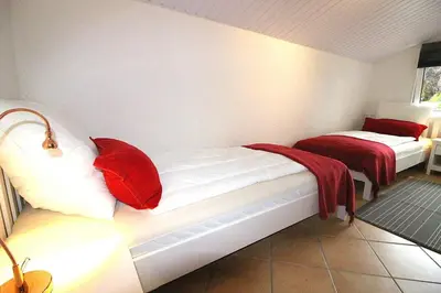 Ein Bett oder Betten in einem Zimmer der Unterkunft Apartmentvermittlung Mehr als Meer - Objekt 56