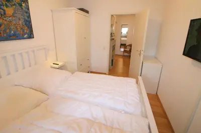 Ein Bett oder Betten in einem Zimmer der Unterkunft Apartmentvermittlung Mehr als Meer - Objekt 11