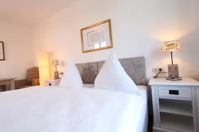 Ein Bett oder Betten in einem Zimmer der Unterkunft Hotel Thormählen