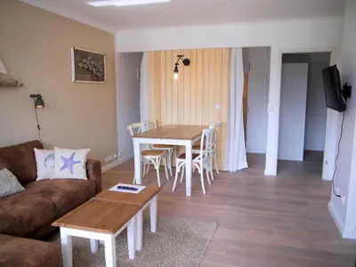 Ein Sitzbereich in der Unterkunft Strandperle 4