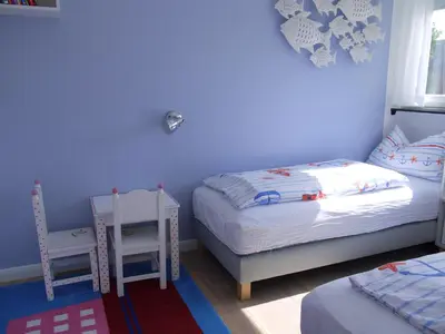 Ein Bett oder Betten in einem Zimmer der Unterkunft Strandperle 4