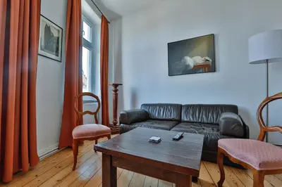 Ein Sitzbereich in der Unterkunft Riverside Apartments