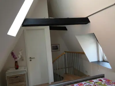 Ein Bett oder Betten in einem Zimmer der Unterkunft Lübecker Ganghausperle Smart