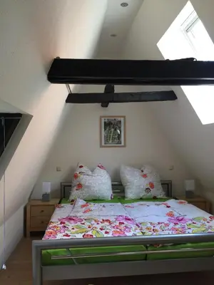 Ein Bett oder Betten in einem Zimmer der Unterkunft Lübecker Ganghausperle Smart