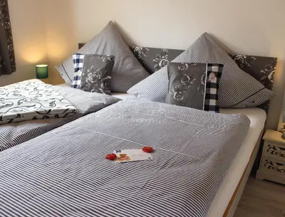 Ein Bett oder Betten in einem Zimmer der Unterkunft Ostseehaus Oe