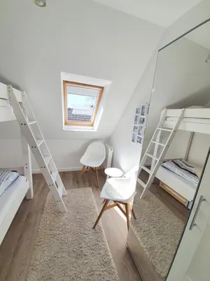 Ein Bett oder Betten in einem Zimmer der Unterkunft FeWo Machedanz am Hafen Timmendorfer Strand OT Niendorf