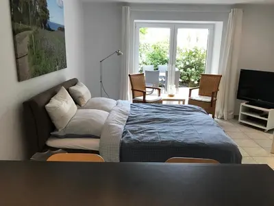 Ein Bett oder Betten in einem Zimmer der Unterkunft Ferienwohnung am Mühlenpark