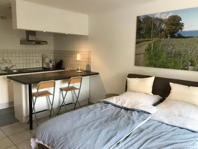 Ein Bett oder Betten in einem Zimmer der Unterkunft Ferienwohnung am Mühlenpark