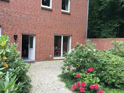 Ein Garten an der Unterkunft Ferienwohnung am Mühlenpark