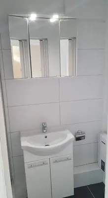 Ein Badezimmer in der Unterkunft Pension Italia