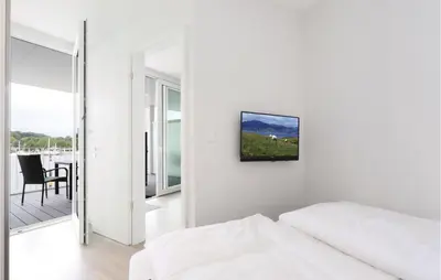 Ein Bett oder Betten in einem Zimmer der Unterkunft Priwallpromenade 2, Whg 8
