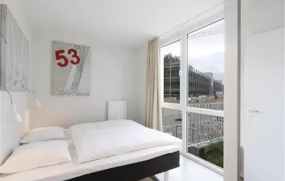 Ein Bett oder Betten in einem Zimmer der Unterkunft Priwallpromenade 3, Whg 3