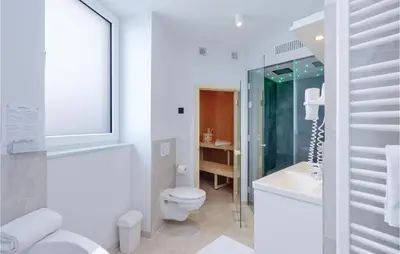 Ein Badezimmer in der Unterkunft Priwallpromenade 29, Whg 12