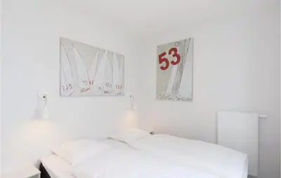 Ein Bett oder Betten in einem Zimmer der Unterkunft Priwallpromenade 29, Whg 15