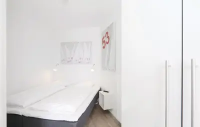 Ein Bett oder Betten in einem Zimmer der Unterkunft Priwallpromenade 31, Whg 21