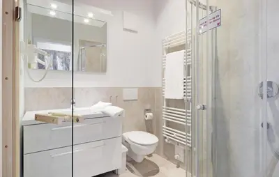 Ein Badezimmer in der Unterkunft Dünenvilla 2, Whg 5