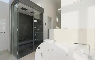 Ein Badezimmer in der Unterkunft Dünenvilla 9, Whg 5