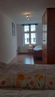 Ein Bett oder Betten in einem Zimmer der Unterkunft 2-Zimmer-Ferienwohnung im 1. Obergeschoss